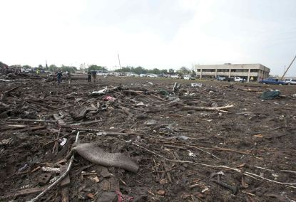 Parts of trees and household debris cover the ground after a huge tornado struck Moore, Oklahoma, near Oklahoma City, May 20, 2013. A massive tornado tore through the Oklahoma City suburb of Moore on Monday, killing at least 51 people as winds of up to 200 miles per hour (320 kph) flattened entire tracts of homes, two schools and a hospital, leaving a wake of tangled wreckage. REUTERS/Richard Rowe (UNITED STATES – Tags: DISASTER ENVIRONMENT