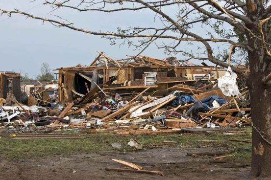 A destroyed house remains after a huge tornado struck Moore, Oklahoma, near Oklahoma City, May 20, 2013. A massive tornado tore through the Oklahoma City suburb of Moore on Monday, killing at least 51 people as winds of up to 200 miles per hour (320 kph) flattened entire tracts of homes, two schools and a hospital, leaving a wake of tangled wreckage. REUTERS/Richard Rowe (UNITED STATES – Tags: DISASTER ENVIRONMENT)